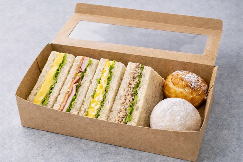 Halal sandwich breakfast box in Singapore with assorted triple decker sandwiches and Japanese snow mochi for office catering